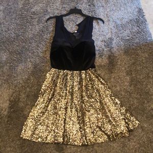 Brand New Guess black and gold illusion top dress.